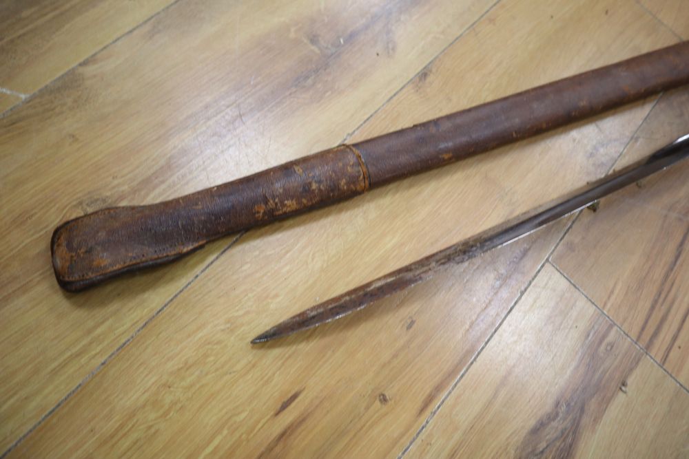 An Edward VII Infantry Officers sword, shagreen grip and 91cm etched, single edged blade, leather scabbard